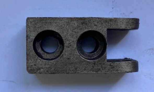 Nottolino a due fori per catena avanzamento